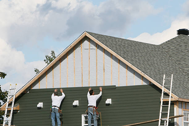 Professional Emergency Siding Repair technician working in Acton, MA